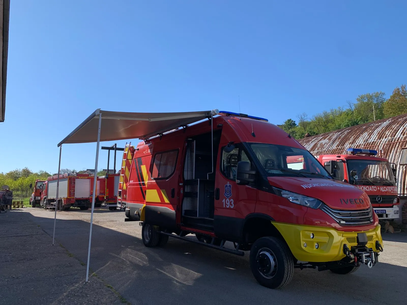 Firefighting vehicle, front and side view